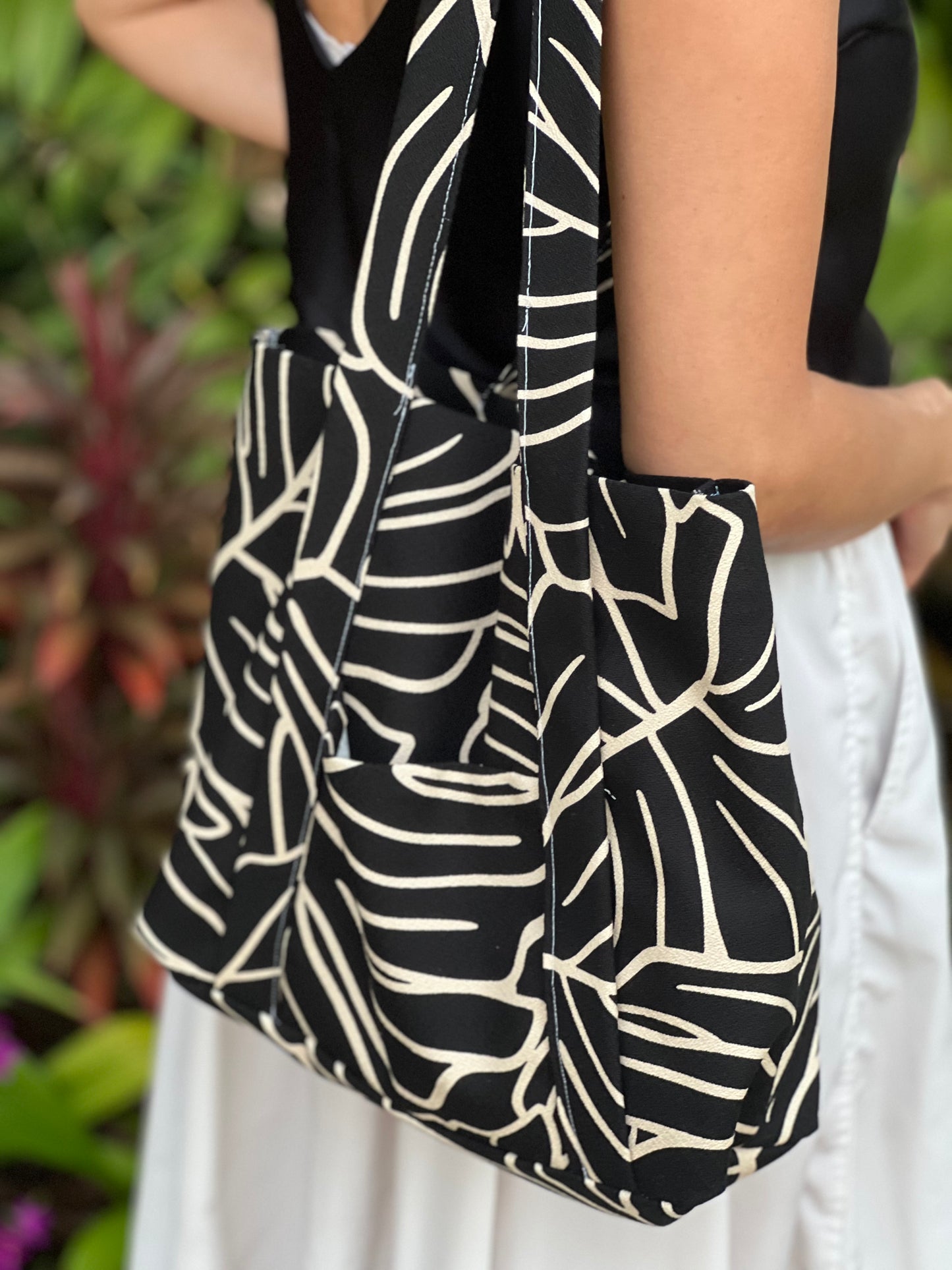 Monstera black tote bag