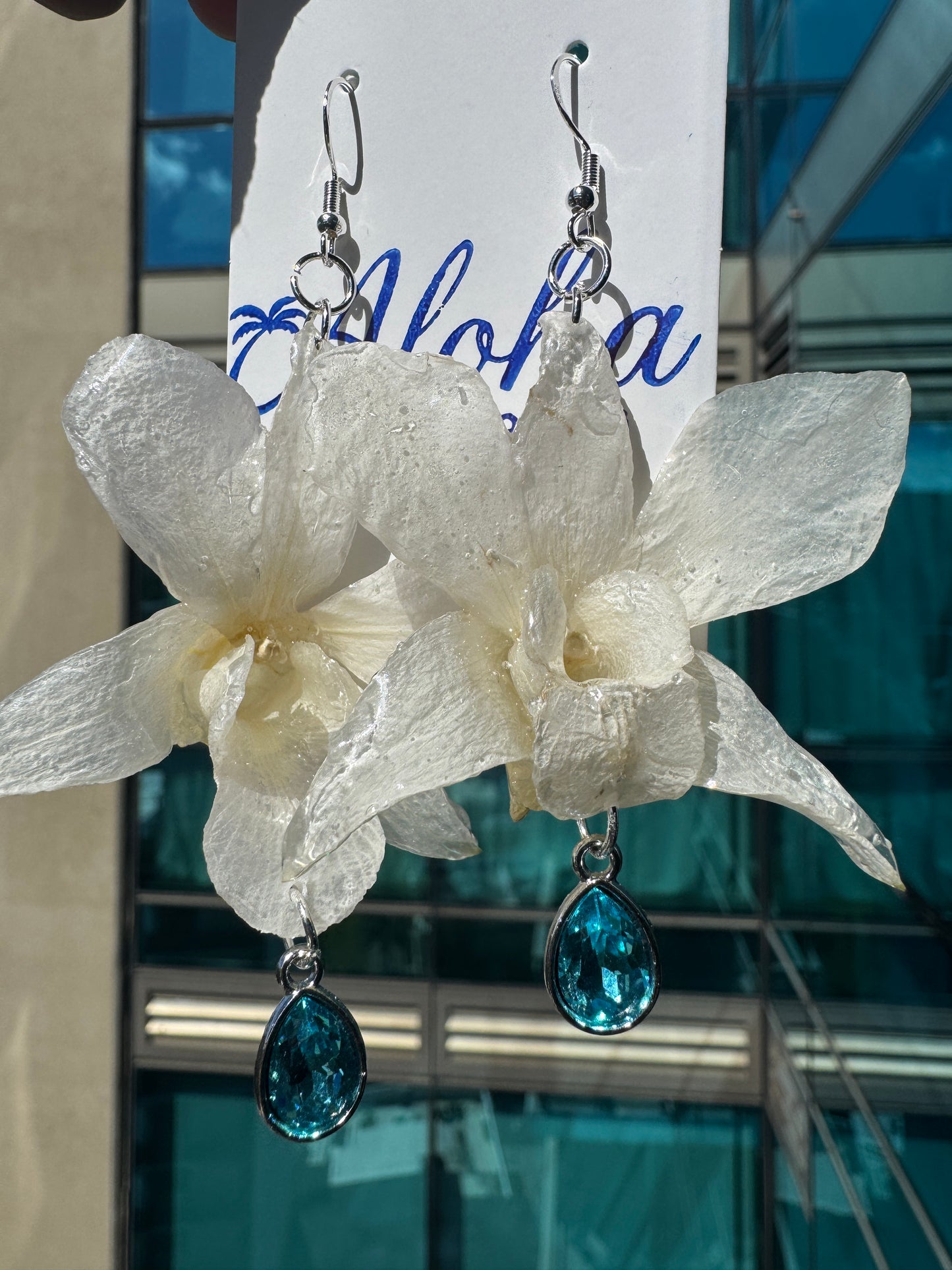 White Orchid with colorful Gem