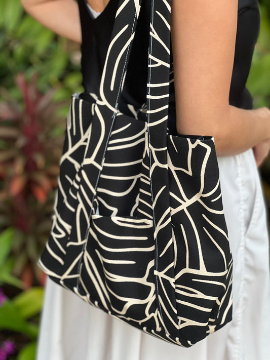 Monstera black tote bag